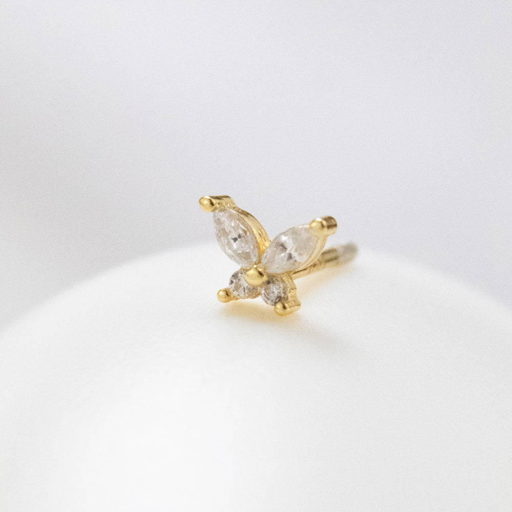 Piercing en forma de mariposa con piedras dorado 